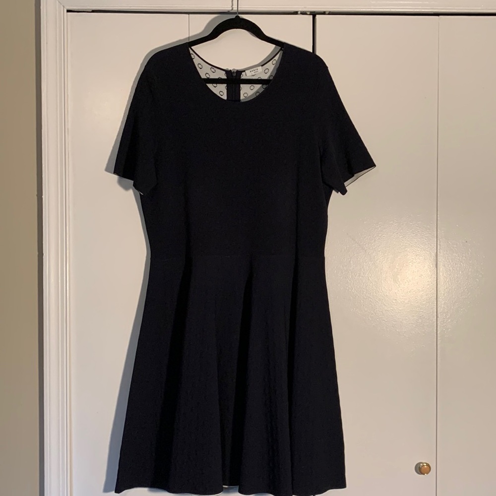 Dark navy fit and flare Akris Punto dress. Very flattering.